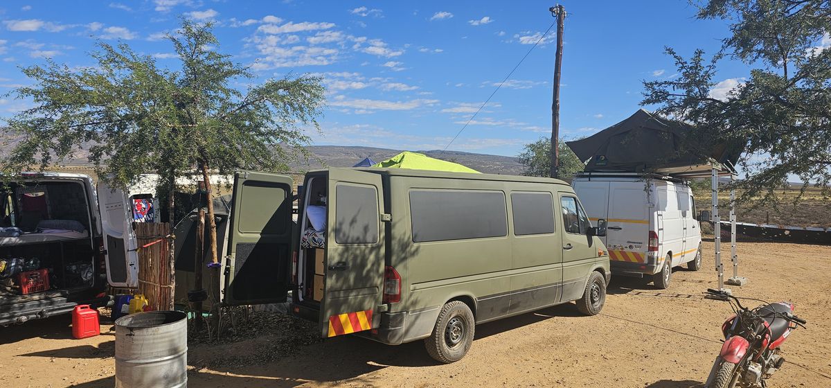 Camping setup with vehicle