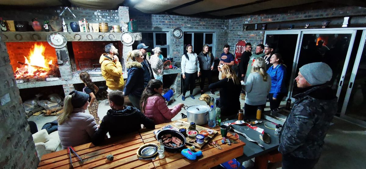 Communal braai room with guests